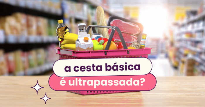 Cesta de mercado cheia de alimentos. No título: "a cesta básica é ultrapassada?".