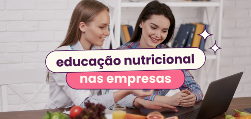 Duas mulheres conversando olhando para um notebook. No título "educação nutricional nas empresas".